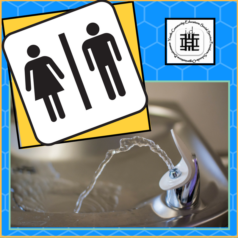 Bathroom Sign and Water Fountain